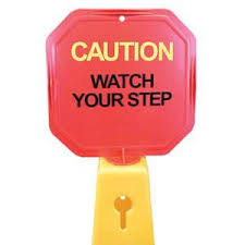 Red Octagon Sign - &#39;Caution -
Watch Your Step&#39;